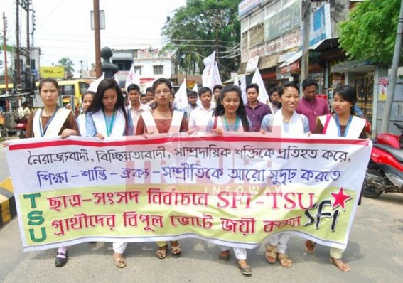 Students walking on roads in class hours with CPI-M’s slogan Students walking on roads in class hours with CPI-M’s slogan